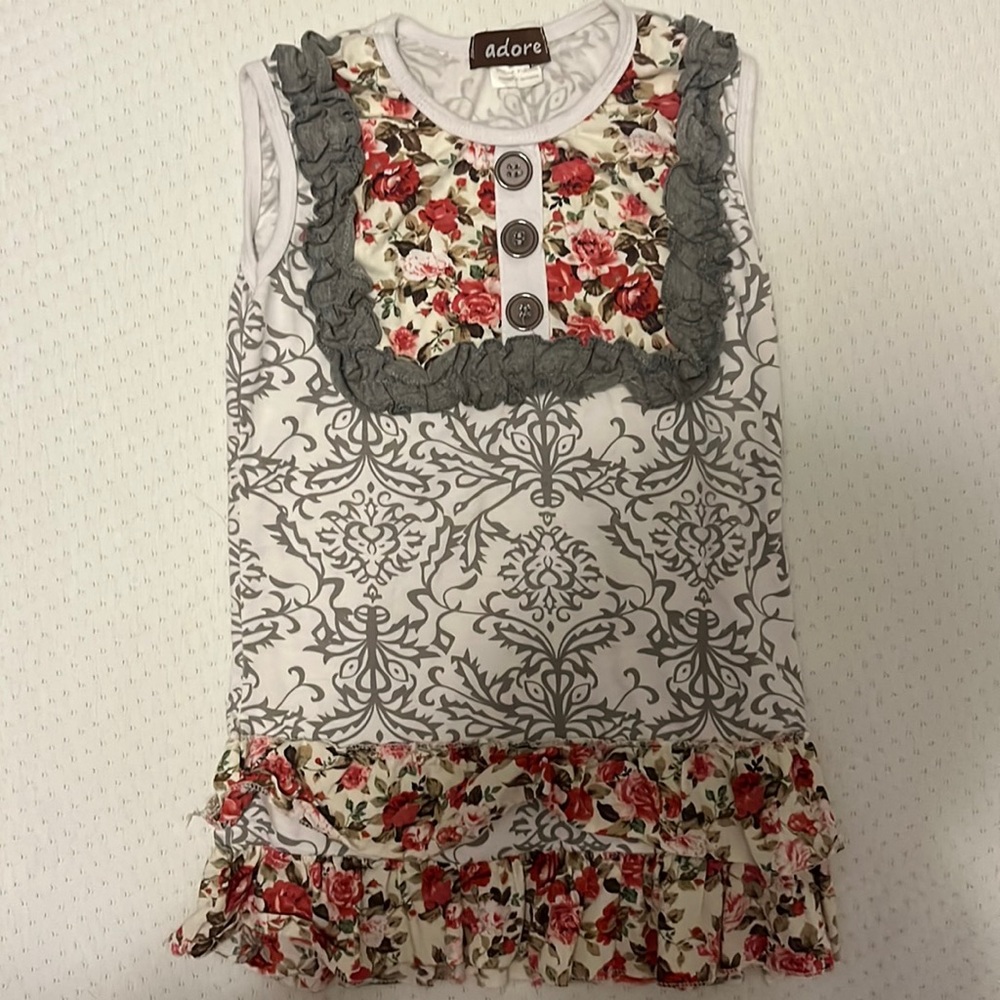 Girl’s 6-7t boutique blouse. Barely worn. Super cute. Button and ruffle detail